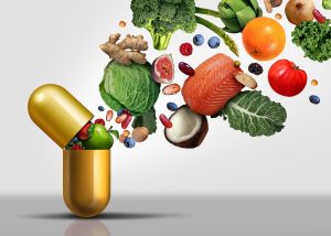 капсула з якої висипаються корисні продукти та овочі